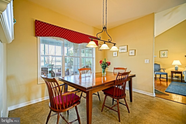 dining room featuring baseboards