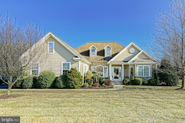 view of front of home with a front yard