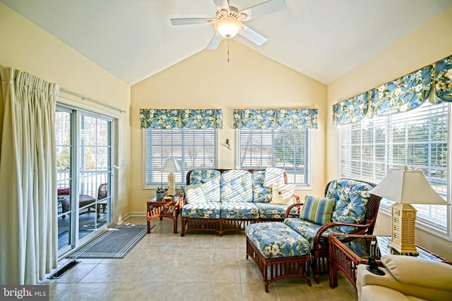 sunroom / solarium with vaulted ceiling and a ceiling fan