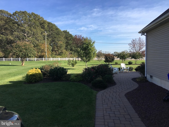 view of yard with a patio area and fence