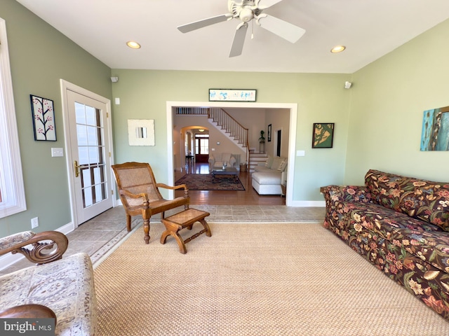 living room featuring ceiling fan