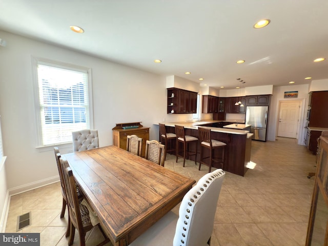 view of tiled dining space