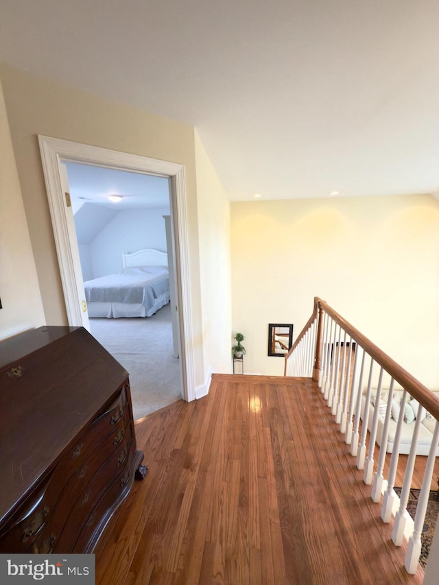 hall featuring dark wood-type flooring