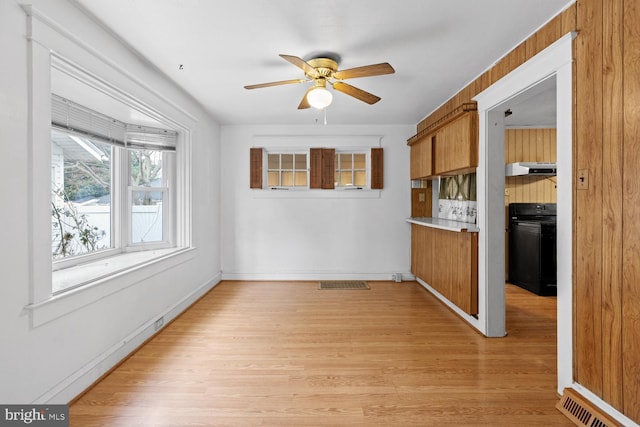 interior space featuring ceiling fan and light hardwood / wood-style flooring