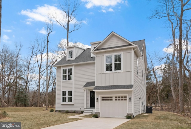 view of front of house featuring roof with shingles, concrete driveway, an attached garage, board and batten siding, and a front yard