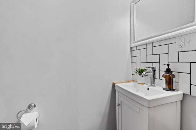 bathroom featuring backsplash and vanity