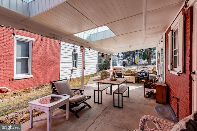 view of patio with outdoor dining area