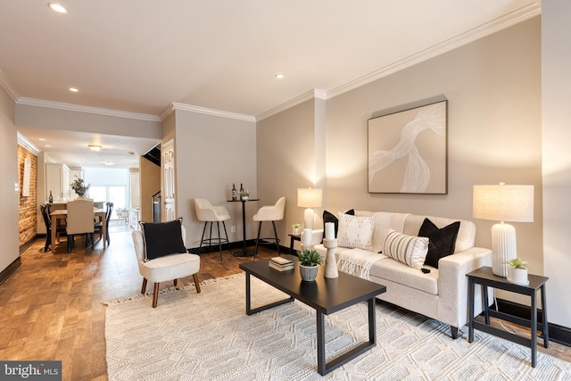 living area with ornamental molding, recessed lighting, wood finished floors, and baseboards