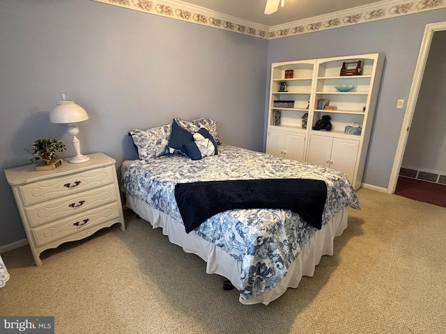 bedroom with baseboards, a ceiling fan, and light colored carpet