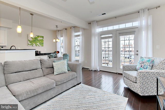 living room featuring dark hardwood / wood-style floors