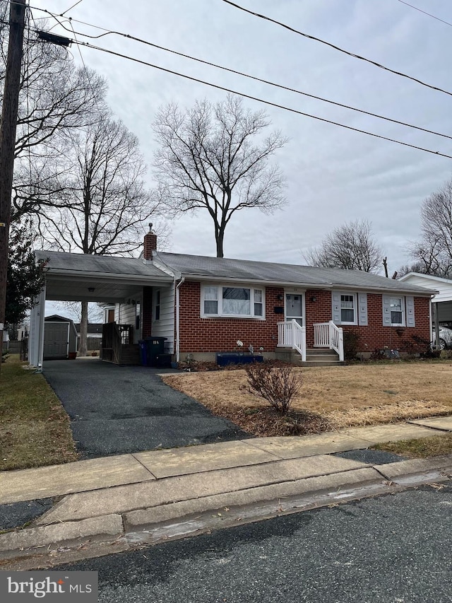 view of front of house featuring a carport