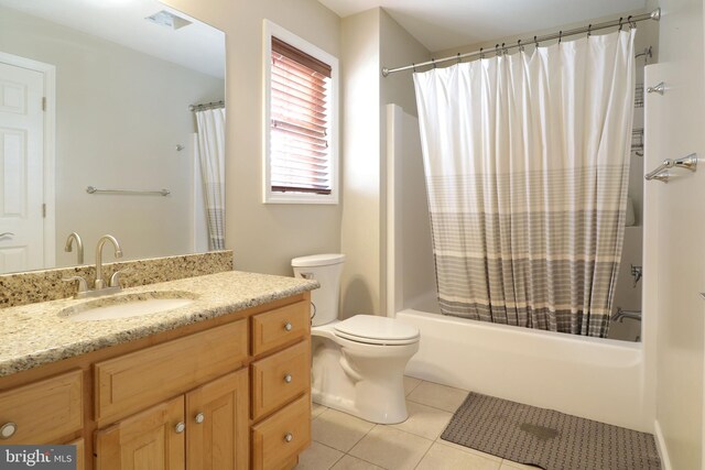 full bathroom featuring shower / tub combo, visible vents, toilet, tile patterned floors, and vanity