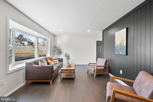 living room featuring dark wood-type flooring