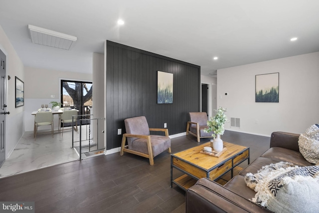 living room with dark hardwood / wood-style floors