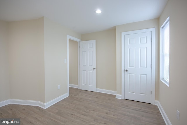 unfurnished bedroom featuring light hardwood / wood-style floors