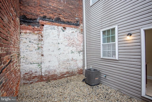 view of side of property featuring cooling unit