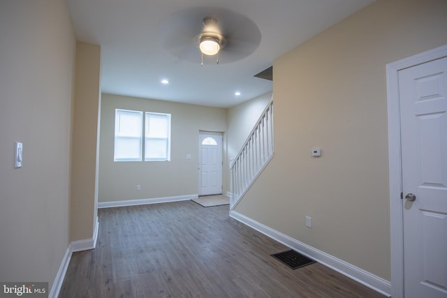 entrance foyer with ceiling fan and dark hardwood / wood-style floors