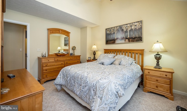 bedroom with light carpet