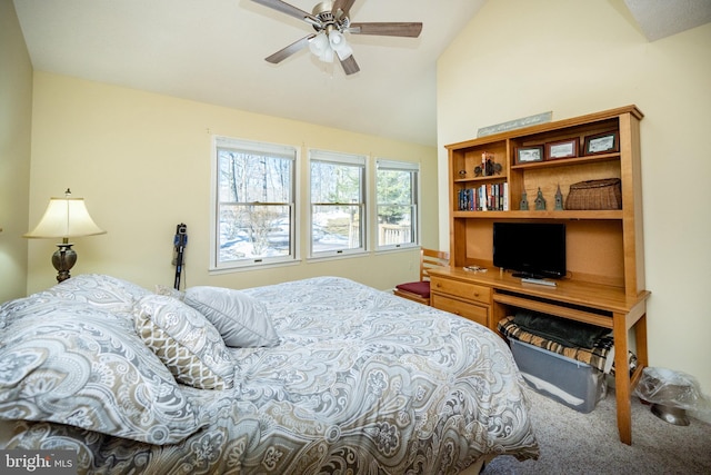 carpeted bedroom with vaulted ceiling and ceiling fan