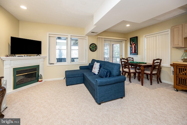 living room with light colored carpet