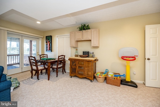 view of carpeted dining space