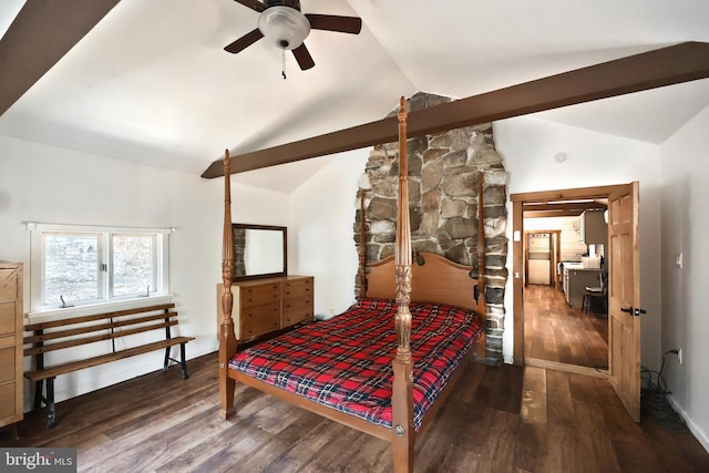 bedroom with wood finished floors and vaulted ceiling with beams