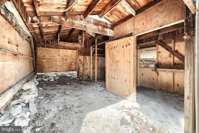 misc room featuring lofted ceiling