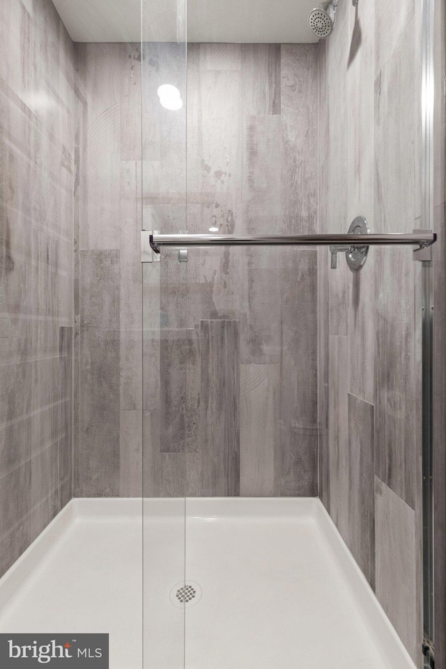 bathroom featuring walk in shower