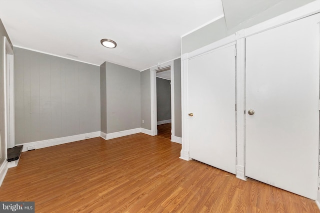 unfurnished bedroom with light hardwood / wood-style flooring