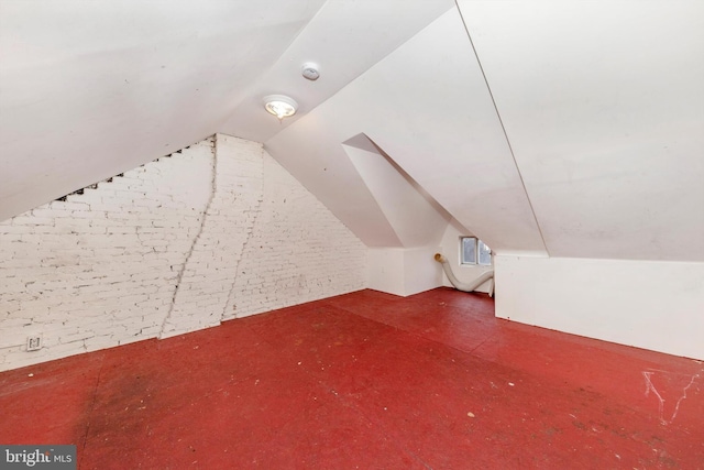 bonus room with vaulted ceiling