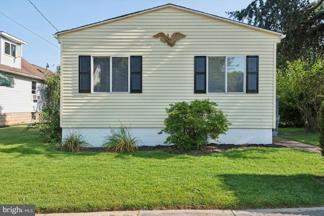 exterior space featuring a front lawn