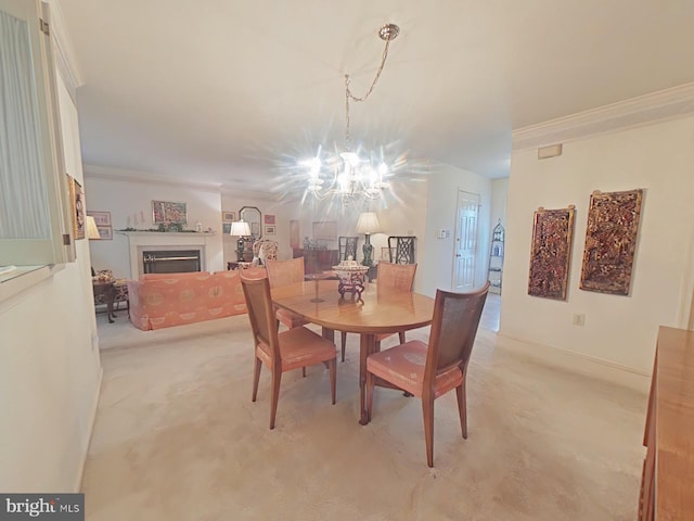 dining area with crown molding, light colored carpet, and a chandelier