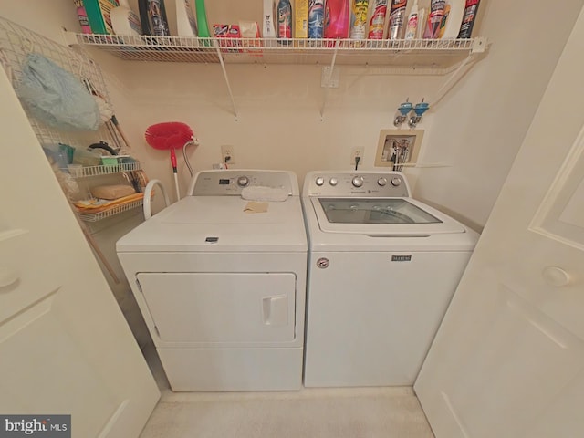 laundry room featuring washing machine and dryer