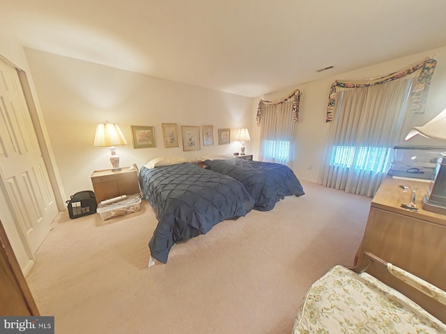 bedroom featuring carpet flooring