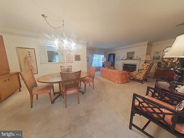 dining space featuring an inviting chandelier, crown molding, and light carpet