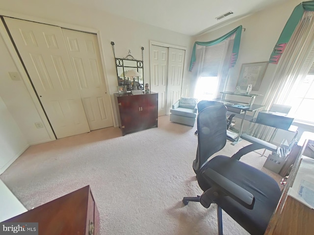 office area with carpet floors and a wealth of natural light