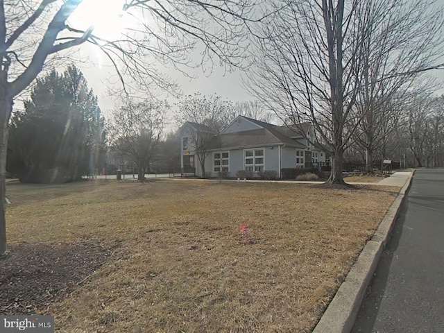 view of front of home with a front lawn