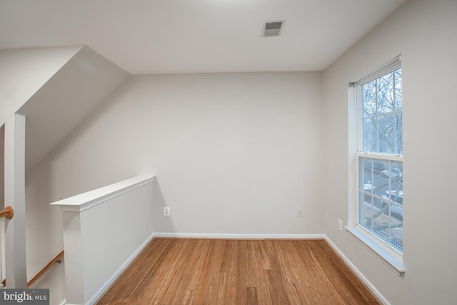 unfurnished room featuring wood-type flooring