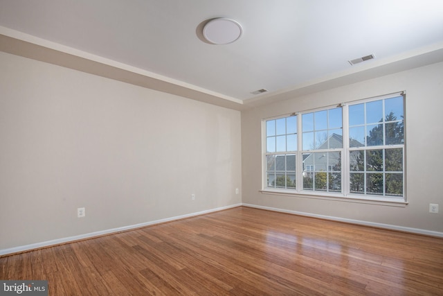 empty room featuring hardwood / wood-style floors