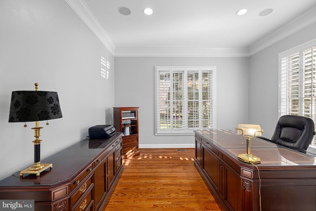 home office featuring crown molding and wood-type flooring