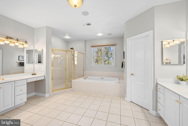 bathroom with tile patterned flooring, vanity, and plus walk in shower