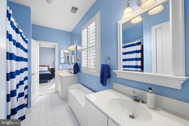 bathroom featuring vanity and tile patterned floors