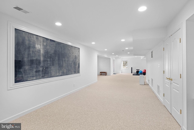 basement with light carpet