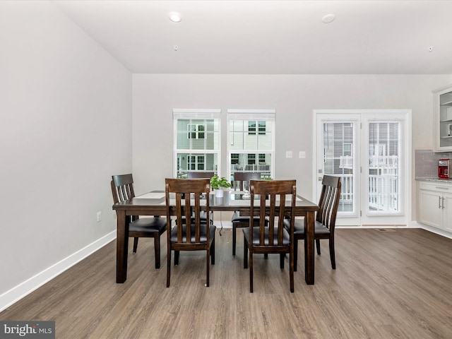 dining room featuring hardwood / wood-style flooring