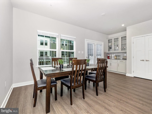 dining room with hardwood / wood-style floors