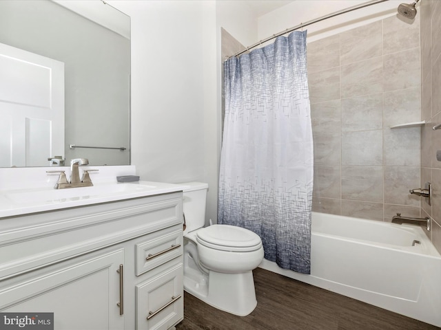 full bathroom featuring shower / bath combination with curtain, wood-type flooring, toilet, and vanity