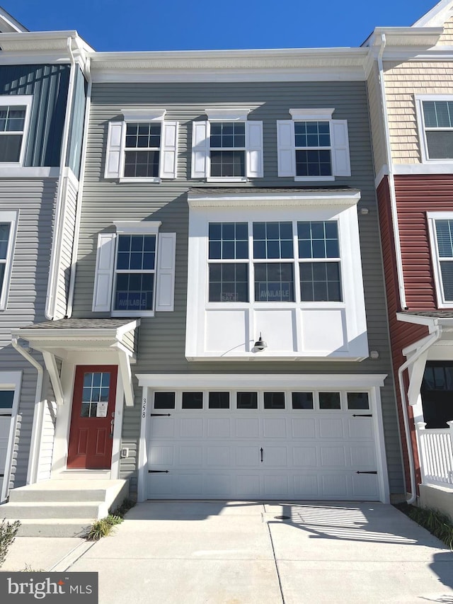 view of property featuring a garage