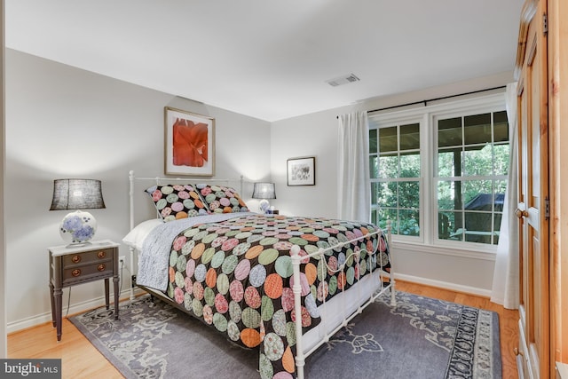 bedroom featuring hardwood / wood-style floors