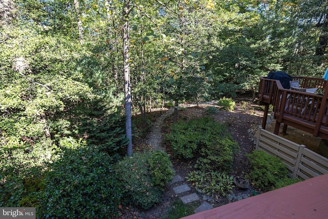 view of yard with a wooden deck