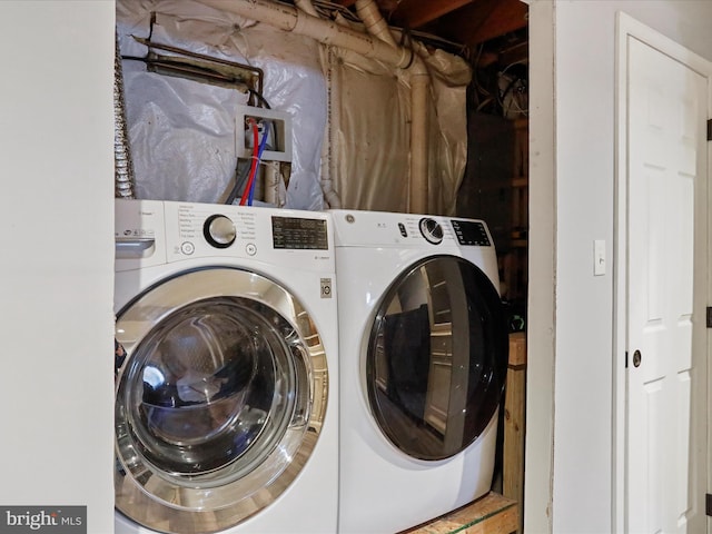 washroom featuring separate washer and dryer